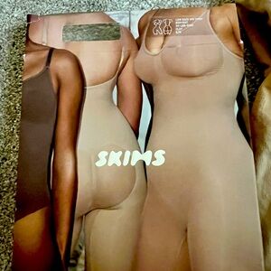 Skims low back mid thigh bodysuit